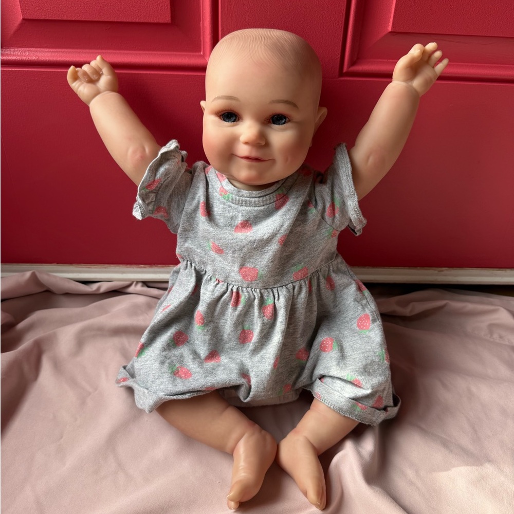 Reborn Doll with Gray and Pink Dress